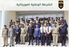 صورة تبادل المهام بين المدير العام للأمن الوطني الجديد و المدير العام للأمن الوطني السابق.