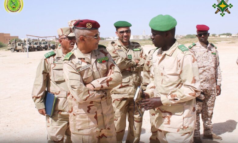 صورة قائد الأركان العامة للجيوش المساعد يتفقد تشكلات عسكرية مشاركة في العرض العسكري